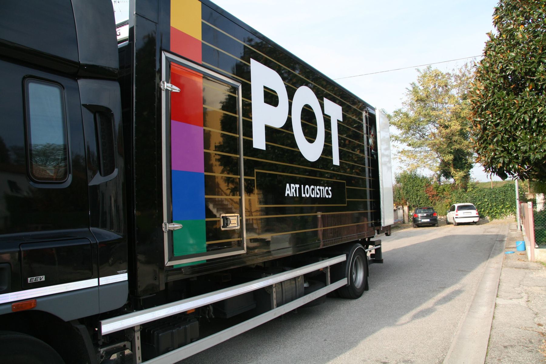 An art transport truck outside the house in Lugo